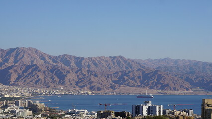 The view of Eilat and Aqaba in Jordan from the Eilat Mountains Reserve in the Southern Negev Desert...