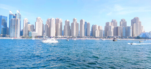 Naklejka premium Dubai Marina cityscape UAE. Panoramic view from the sea side