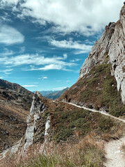 boy is hiking in the mountains of austria