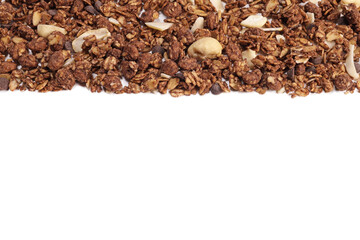 granola with nuts and fruits on a white background. copy space for text