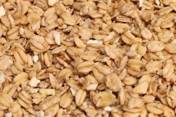 Background, texture of granola with oatmeal with nuts and fruits. Selective Focus