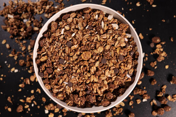 granola with oatmeal with nuts and fruits in a bowl. Selective Focus
