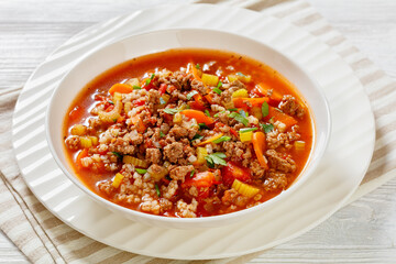Hamburger Soup with barley and vegetables in bowl