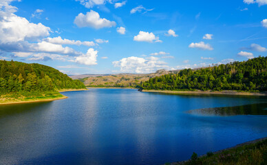 Sösetalsperre near Osterode am Harz. View of the reservoir with the surrounding idyllic nature. Landscape at the lake in the Harz National Park.
