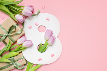 
delicate festive mockup figure eight shape with pink tulips, gifts and hearts on a pastel pink...