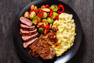 beef steak with potato mash and roasted vegetables