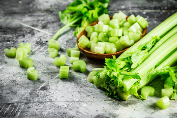 Cut into small pieces of celery in a plate. 