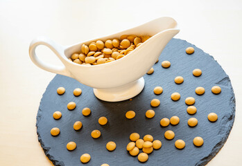 Caramel chocolate flakes in a white ceramic bowl