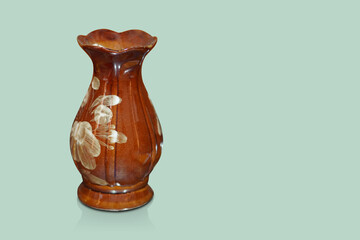 old brown ceramic vase on green background, object, decor, home, house, fashion, banner, template, copy space