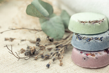 Close-up, multicolored handmade soap on a blurred background.