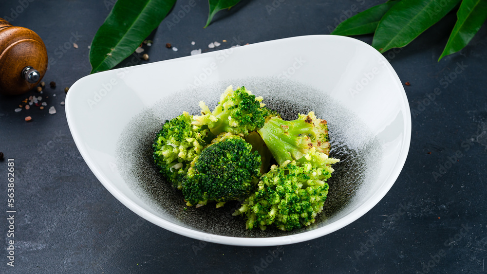 Sticker garnish fried broccoli pieces in a bowl.