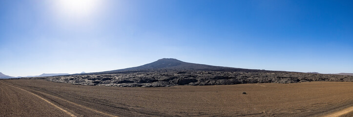 Views across the black lava volcano field of Jabal Qidr in the Harrat Khaybar region, north west Saudi Arabia