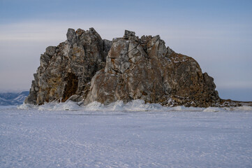 Fototapeta na wymiar Shamanka Rock. sunset. Olkhon Island. snowy and frosty winter.