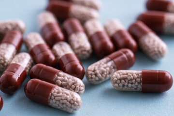 Capsules on a blue background.