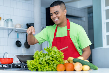 Motivated latin american chef apprentice  preparing vegetarian or vegan food