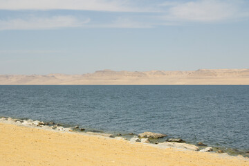 Wide View of the Qarun LakeShore with a mountains and Clear Sky - Fayoum - Egypt