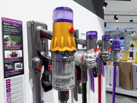 PENANG, MALAYSIA - NOV 22, 2022: Dyson V12 Detect Slim Absolute cordless vacuum close up in electrical store.