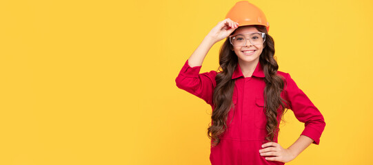 Architect teenager girl. kid future engineer on yellow background. safety glasses for repairing. Child builder in helmet horizontal poster design. Banner header, copy space.