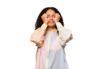 Young african american curly woman isolated crying, unhappy with something, agony and confusion concept.
