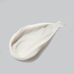 cosmetic cream on a grey background