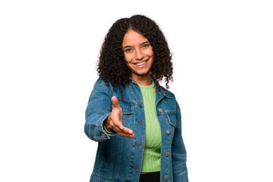 Young african american curly woman isolated stretching hand at camera in greeting gesture.