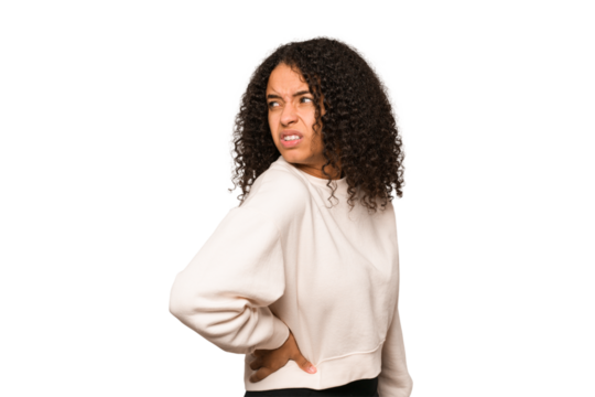 Young african american curly woman isolated suffering a back pain.