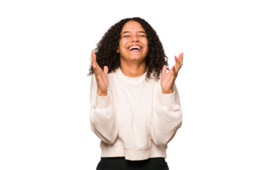 Young african american curly woman isolated laughs out loudly keeping hand on chest.