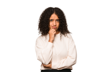 Young african american curly woman isolated looking sideways with doubtful and skeptical expression.