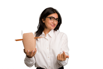 Young business indian woman eating takeaway noodles cut out isolated pointing with finger at you as if inviting come closer.
