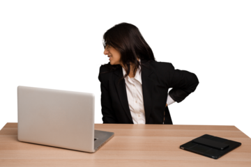 Young indian woman in a table with a laptop and tablet isolated suffering a back pain.