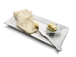 Preparación de un sándwich, untar mantequilla. Preparation of a sandwich, spread butter.