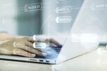 Multi exposure of abstract programming language hologram with world map and hands typing on...