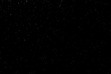 Abstract black background with sparkles and shadows. Fluidity, waves, glitter, fluid, glitter, shimmer. Stars, stardust, space, outer space, comets, placer.