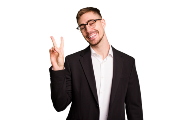 Young caucasian business man cutout isolated joyful and carefree showing a peace symbol with fingers.