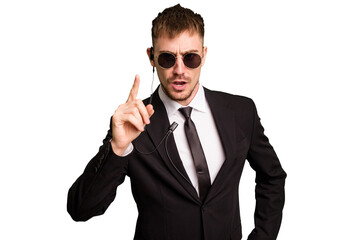 Security bodyguard man wearing a suit isolated cut out having an idea, inspiration concept.