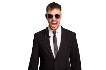 Security bodyguard man wearing a suit isolated cut out screaming very angry and aggressive.