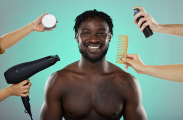 Hair, makeover and salon treatment with man in studio portrait with smile, hairdryer and comb on...