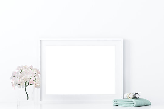 white photo frame with flowers