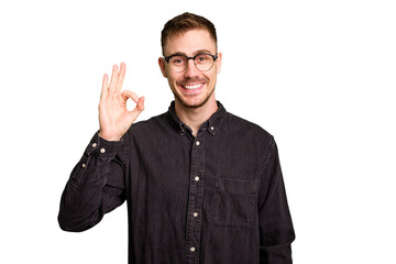 Young caucasian man cut out isolated cheerful and confident showing ok gesture.