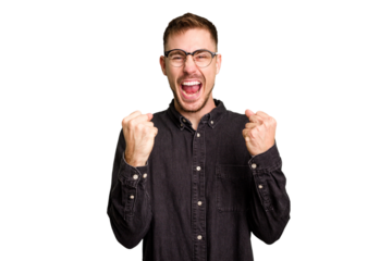 Young caucasian man cut out isolated cheering carefree and excited. Victory concept.