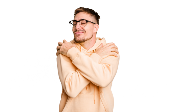 Young caucasian man cut out isolated hugs, smiling carefree and happy.