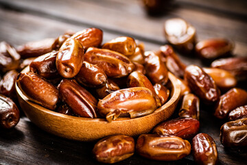 Ripe dates on a plate. 