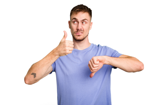 Young caucasian man cut out isolated showing thumbs up and thumbs down, difficult choose concept