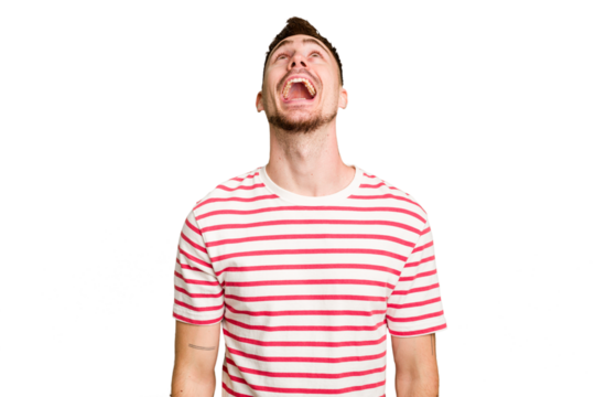 Young caucasian man cut out isolated relaxed and happy laughing, neck stretched showing teeth.