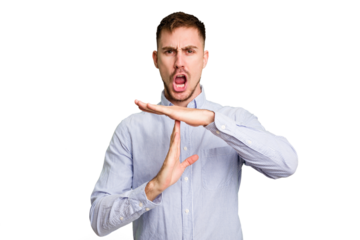 Young caucasian man cut out isolated showing a timeout gesture.