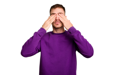 Young caucasian man cut out isolated afraid covering eyes with hands.