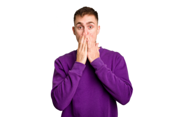 Young caucasian man cut out isolated shocked, covering mouth with hands, anxious to discover something new.