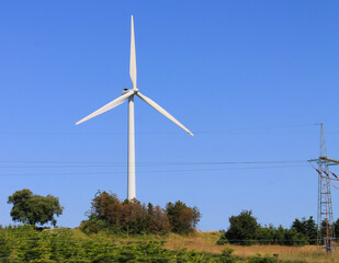 Wind turbines in Denmark producing electricity or power as renewable and environmentally friendly...
