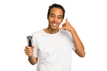 Young African American man holding a razor isolated showing a mobile phone call gesture with fingers.
