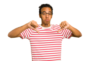 Young African American man isolated showing a dislike gesture, thumbs down. Disagreement concept.